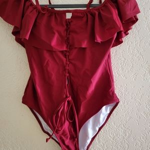 Red ruffled one piece bathing suit size large.